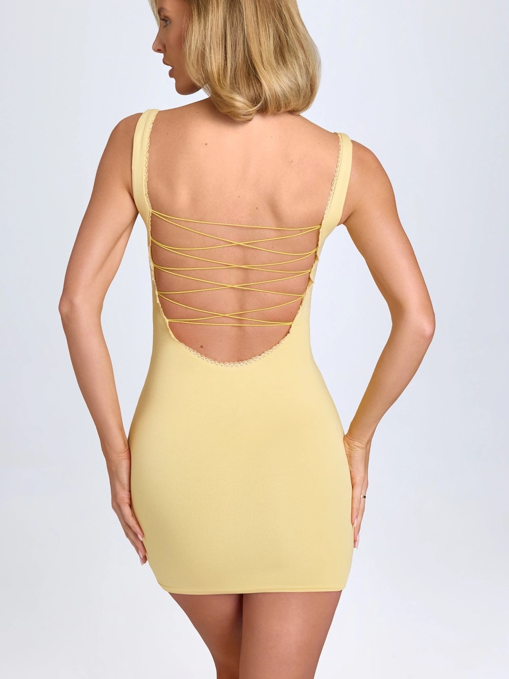 OH POLLY Aoife Modal Lace-Trim Bodycon Mini Dress in Pastel Yellow
